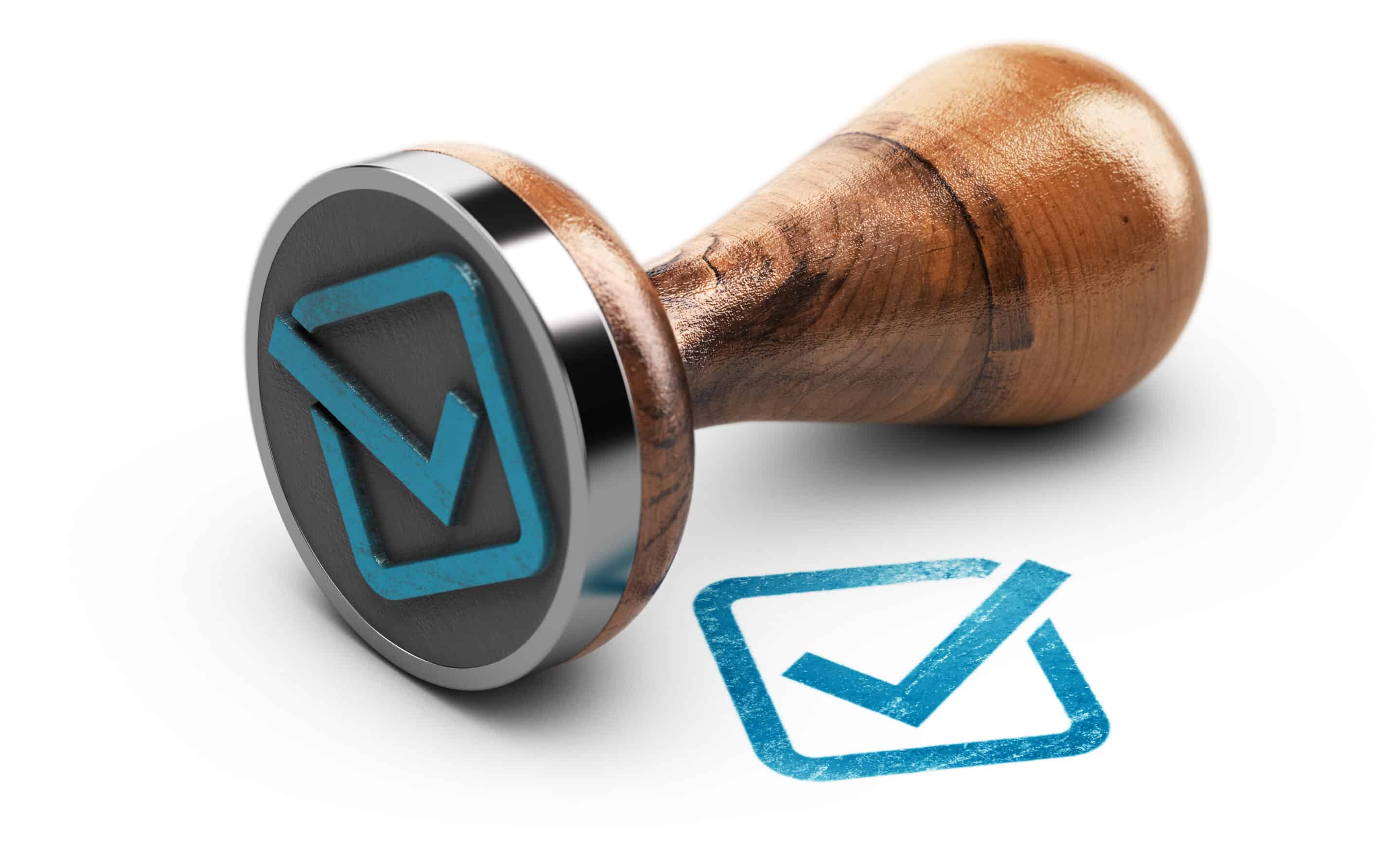 blue-check-mark-stamp-on-white-surface